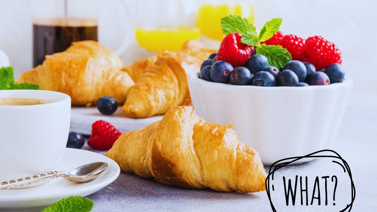 Stylish Continental Breakfast Chair for Modern Homes 5 Contemporary kitchen with sleek black continental breakfast chairs, complementing the modern decor and white marble countertop